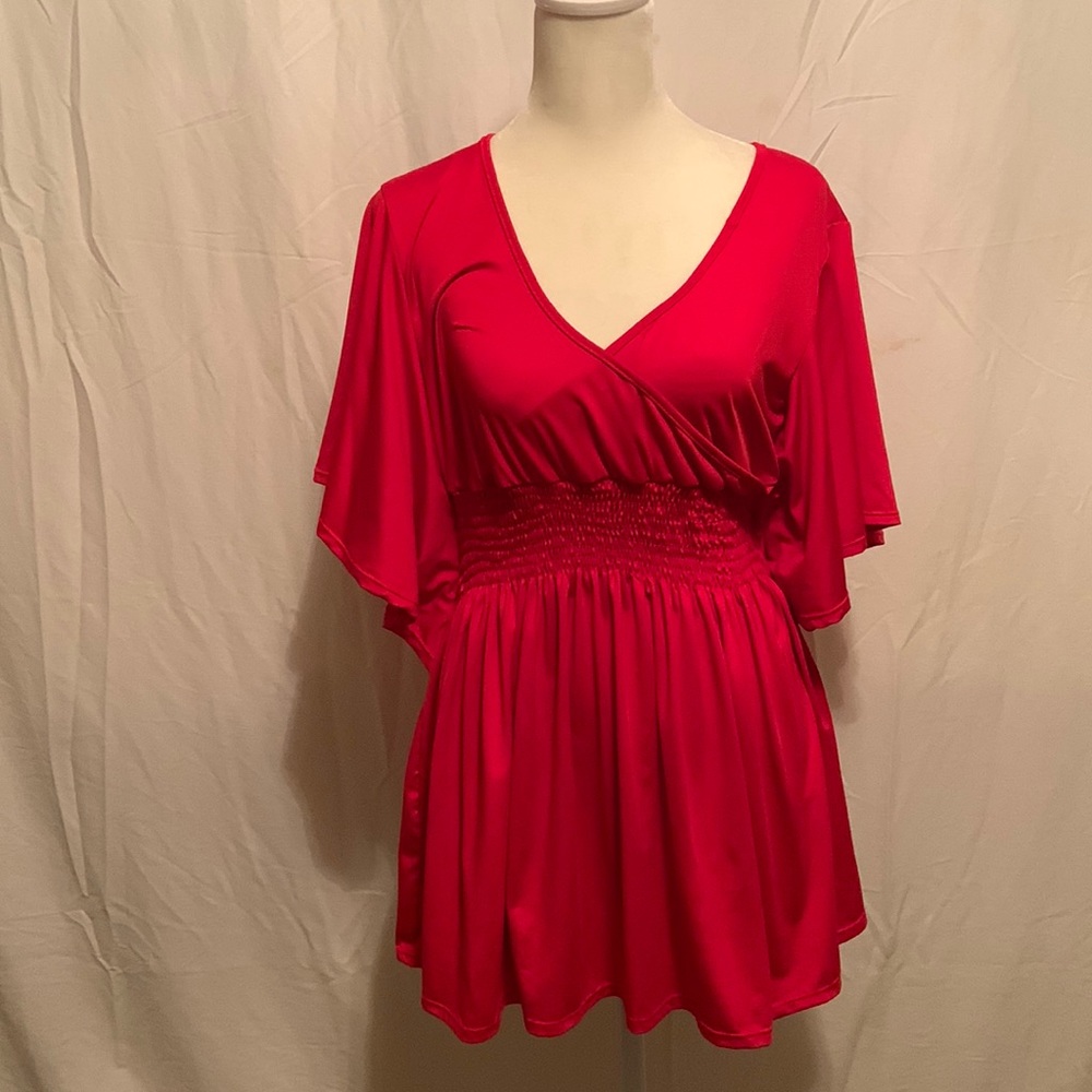 Red Crisscross waist, bat winged sleeved top